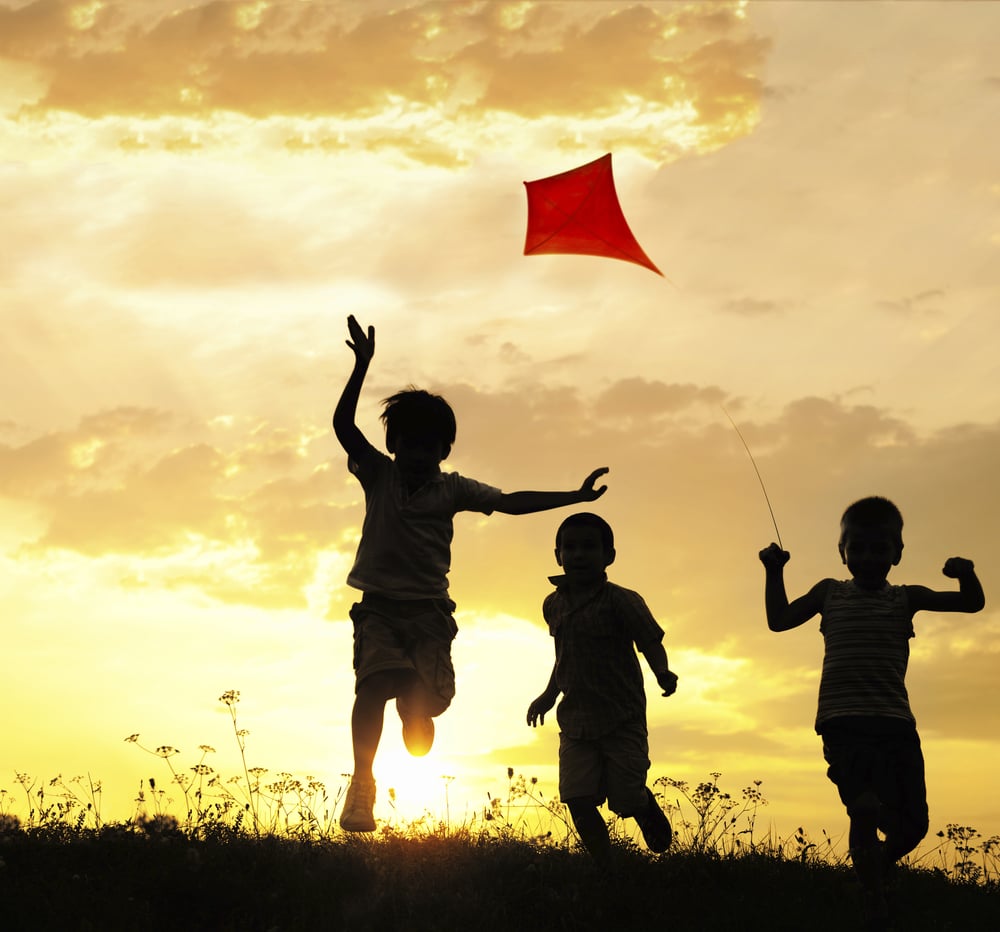 Image of children running and playing